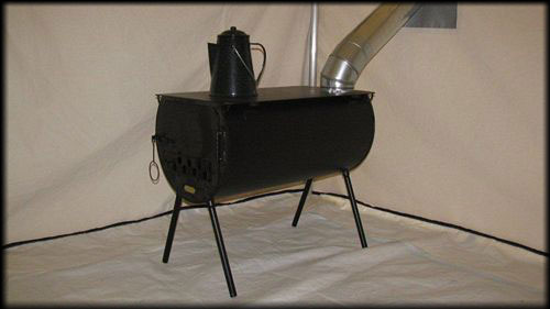 Woodstove with cooking surface inside a wall tent